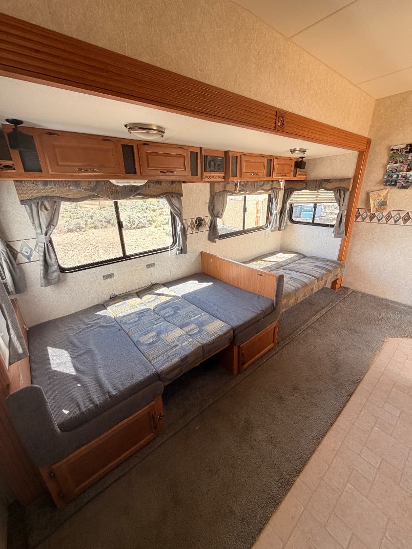 The dinette in The Quantum folded flat into an extra bed, giving a sixth sleeping space